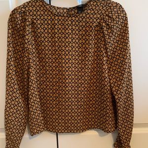 Black and gold patterned top